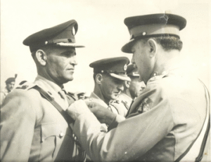 Maj Malik Munawar Khan Awan being awarded by Ayub Khan